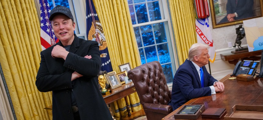 Billionaire Elon Musk, left, and President Donald Trump speak with reporters in the Oval Office on Feb. 11, 2025.