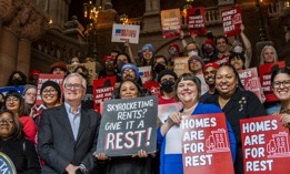 Lawmakers and advocates rally in Albany for the REST Act, which would make it easier for municipalities to opt-in to rent stabilization.