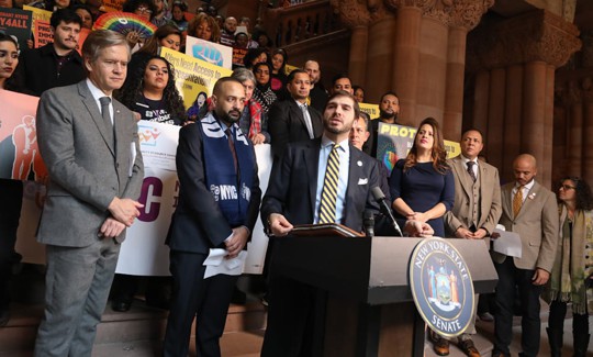 State Sen. Andrew Gounardes speaks at a rally for the New York for All Act in Albany.