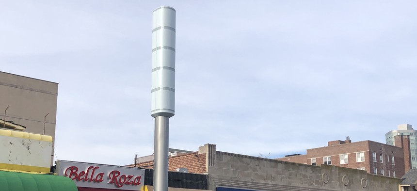 A Link5G tower on a busy street in Rego Park, Queens