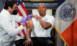 New York City Mayor Eric Adams receives a COVID-19 vaccine booster on Sept. 20, 2022.