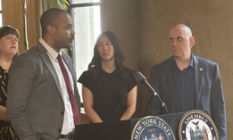 State Sen. Jabari Brisport, left, and Assembly Member Harvey Epstein, right, hold a press conference to introduce their new bill on May 1, 2025.