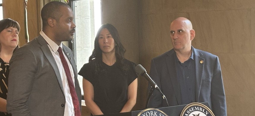 State Sen. Jabari Brisport, left, and Assembly Member Harvey Epstein, right, hold a press conference to introduce their new bill on May 1, 2025.