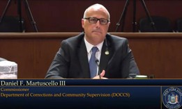 State Department of Corrections and Community Supervision Commissioner Daniel Martuscello III testifies at a legislative hearing on May 14, 2025.