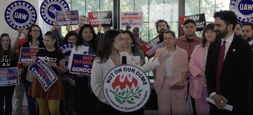 Rep. Alexandria Ocasio-Cortez praises Assembly Member Zohran Mamdani at a press conference in support of his bill, the “Not On Our Dime Act,” on May 20, 2024.