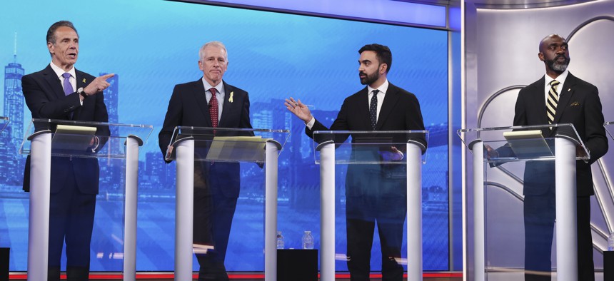 From left, mayoral candidates Andrew Cuomo, Whitney Tilson, Zohran Mamdani and Michael Blake participate in the first Democratic primary debate.