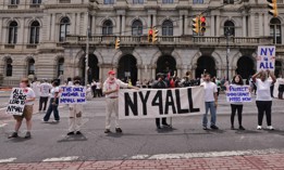 Advocates protest in favor of the New York for All Act outside the state Capitol on June 12, 2025.