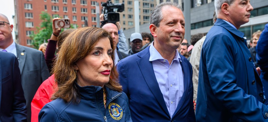 Gov. Kathy Hochul walks out of 26 Federal Plaza with newly released New York City Comptroller Brad Lander on June 17, 2025.