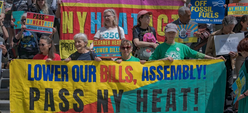 Demonstrators at an Earth Day rally call on the Assembly to pass the NY HEAT Act.