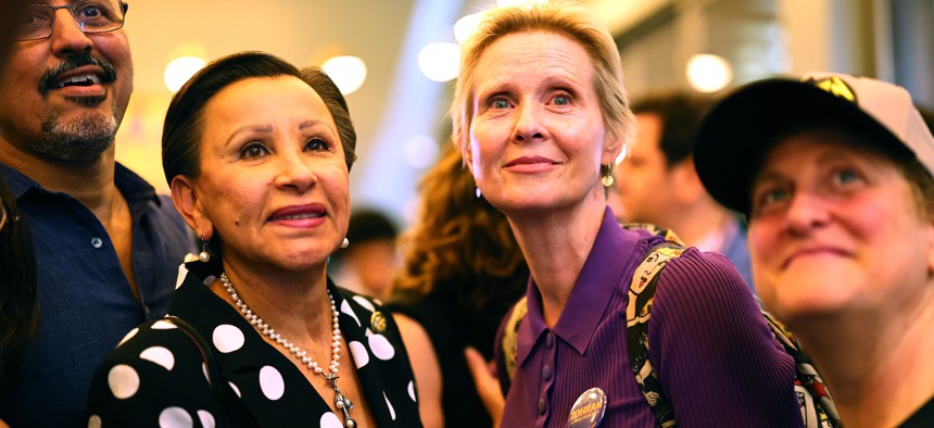 Actor and activist Cynthia Nixon (center) and Rep Nydia Velazquez watch election returns during an election night party for New York City mayoral candidate Zohran Mamdani) at The Greats of Craft LIC in Long Island City, Queens, on June 24, 2025.