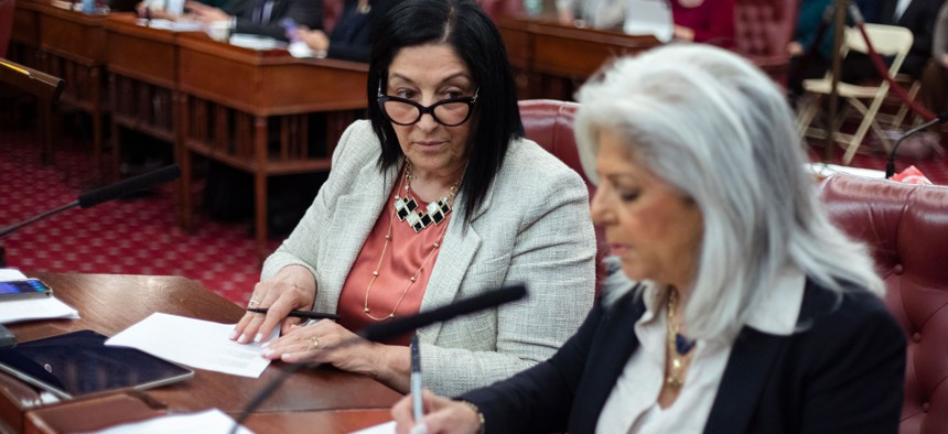 New York City Council Minority Leader Joann Ariola, left, and Minority Whip Vickie Paladino confer at a council meeting in May.