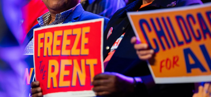 A supporter holds a “Freeze the Rent” sign during a rally for mayoral candidate Zohran Mamdani at Brooklyn Steel on May 4, 2025.