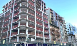A mixed-use building is under construction in Hell’s Kitchen. The charter revision panel wants to streamline the process to build new housing.