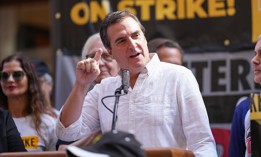 State Sen. Michael Gianaris speaks at a writers strike rally in 2023.