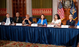Gov. Kathy Hochul, center, holds a press conference with Assembly Speaker Carl Heastie and Texas state lawmakers.
