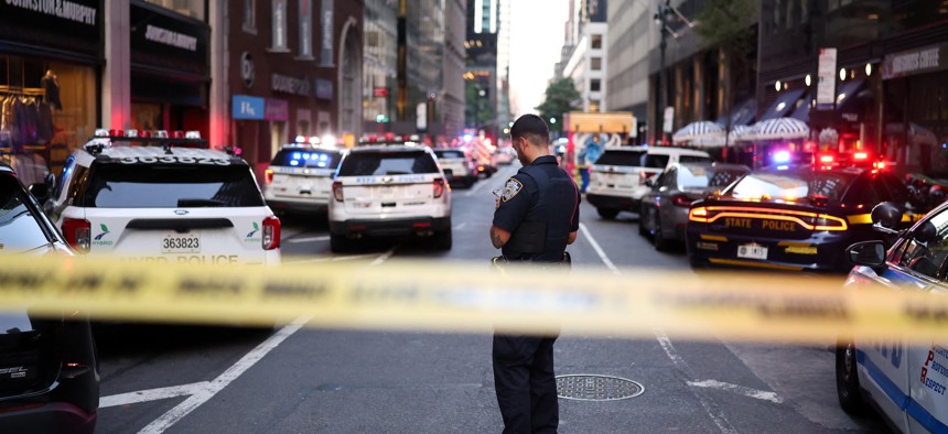 Police respond to the mass shooting in midtown Manhattan on July 28, 2025.