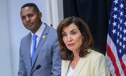 Rep. Ritchie Torres and Gov. Kathy Hochul speak at a press conference about the negative effects of President Donald Trump’s federal budget bill on Aug. 18, 2025.