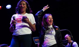 Jasmine Gripper, left, and Ana María Archila, right, on stage at a Zohran Mamdani rally on May 4.