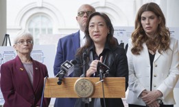 New York City Council Members Linda Lee, center, and Julie Menin, right, call for Congress to fully fund the World Trade Center Health Program at a press conference on Sept. 10, 2025.