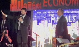 Democratic mayor nominee Zohran Mamdani speaks at the 2025 Mazals Awards as New York City Comptroller Brad Lander looks on.