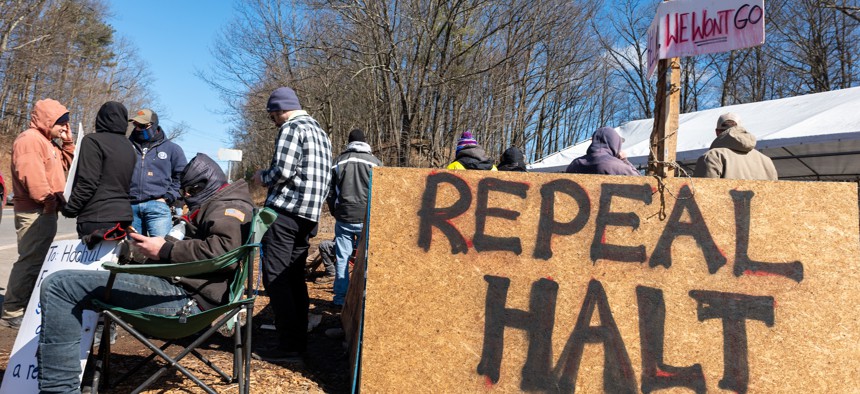 State corrections officers call for the repeal of the HALT Act during a wildcat strike on Feb. 28, 2025.