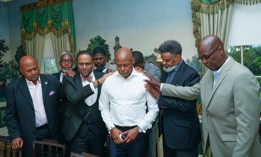 Mayor Eric Adams bows his head during a meeting with clergy leaders of The Baptist Ministers Conference of Greater New York and Vicinity at Gracie Mansion on Sept. 25, 2025.