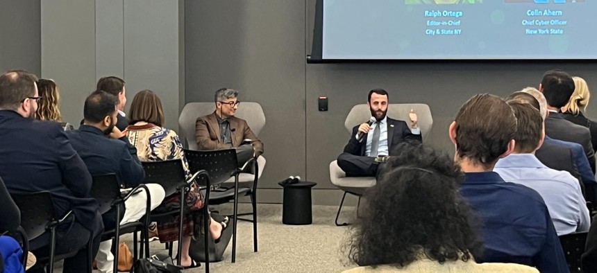Editor-in-Chief Ralph R. Ortega (left) and Colin Ahern, the state’s chief cyber officer, do a fireside chat interview at City & State’s Information Security Summit on Oct. 10, 2025 at EmblemHealth.