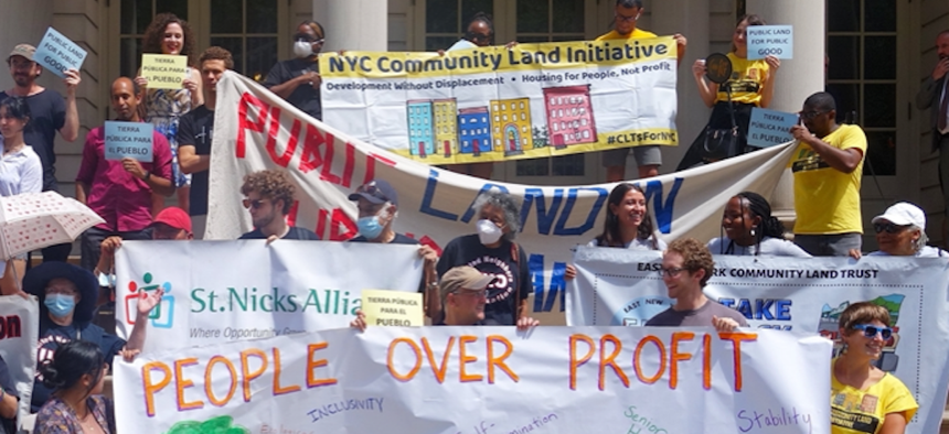 Activists rally for legislation supporting community land trusts and community development corporations.