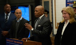 New York City Mayor Eric Adams convened reporters in Times Square on Friday.