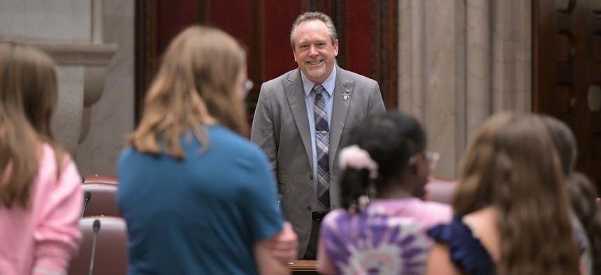 State Sen. Peter Oberacker meets with students from his district in the state Capitol.