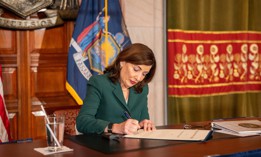 Gov. Kathy Hochul signs a bill into law on June 27, 2025.