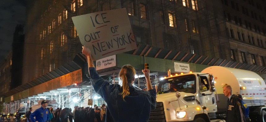 Protesters gather outside the Jacob K. Javits Federal Building in lower Manhattan.