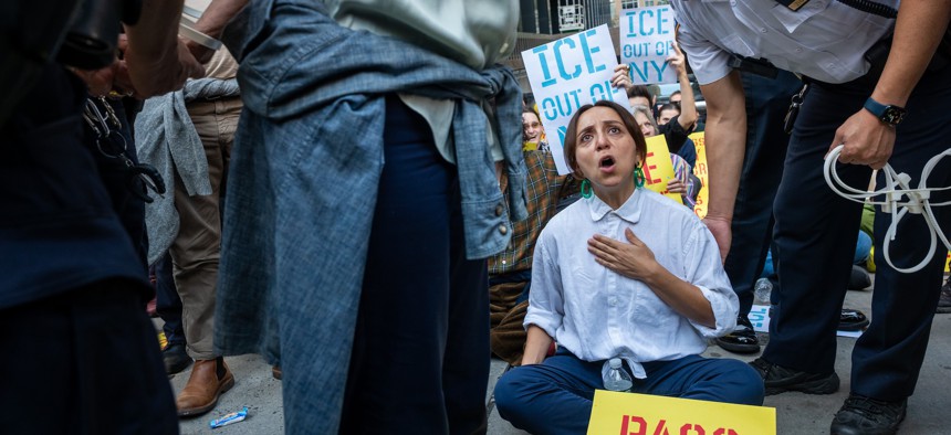Diana Moreno participates in a sit-in outside 26 Federal Plaza to protest U.S. Immigration and Customs Enforcement.