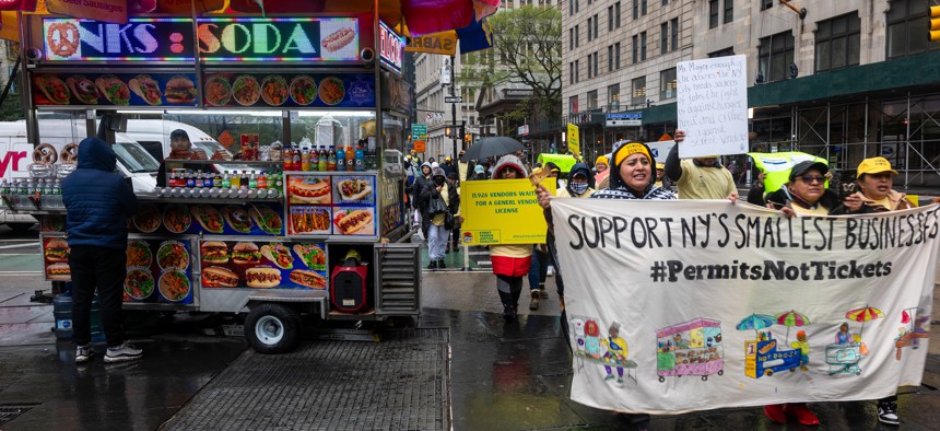 Street vendors participate in a rally calling for expanded access to vending permits on April 18, 2024.