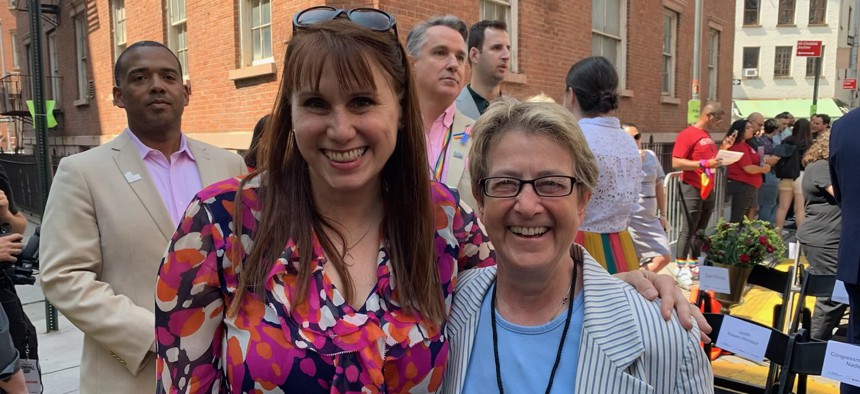 Assembly Member Deborah Glick, right, stands with her preferred successor Jeannine Kiely, left, at the groundbreaking ceremony for the Stonewall National Monument Visitor Center on June 24, 2022.