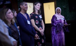 Cathleen McCadden Benjamin, center left, and Elle Bisgaard-Church, center right.