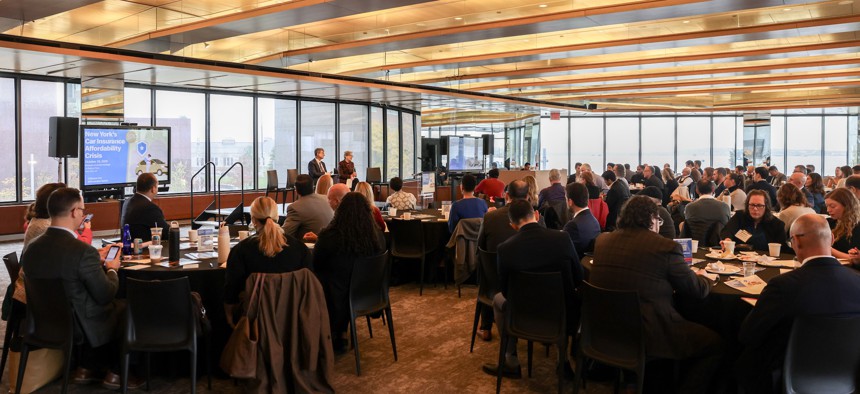 Attendees listen to a fireside chat discussion between Kathy Wylde, president and chief executive at the Partnership for New York City, and Editor-in-Chief Ralph R. Ortega at City & State’s New York Car Insurance Affordability Crisis event, presented in partnership with Citizens for Affordable Rates, at the Museum of Jewish Heritage on Oct. 29, 2025.