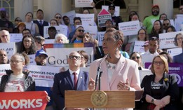 New York City Council Speaker Adrienne Adams, center, and Human Services Council Executive Director Michelle Jackson, attend a press conference outside City Hall to push for legislation to reduce the city’s payment delays to nonprofits, on April 30, 2025.