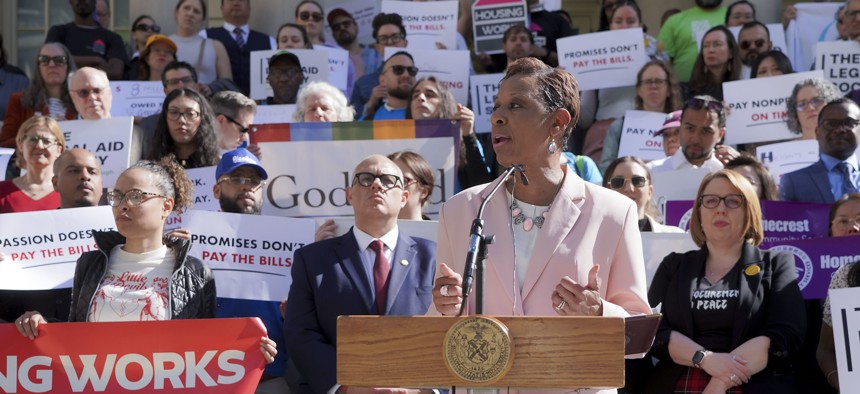 New York City Council Speaker Adrienne Adams, center, and Human Services Council Executive Director Michelle Jackson, attend a press conference outside City Hall to push for legislation to reduce the city’s payment delays to nonprofits, on April 30, 2025.