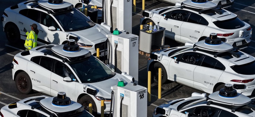 Robotaxis charge in San Francisco.