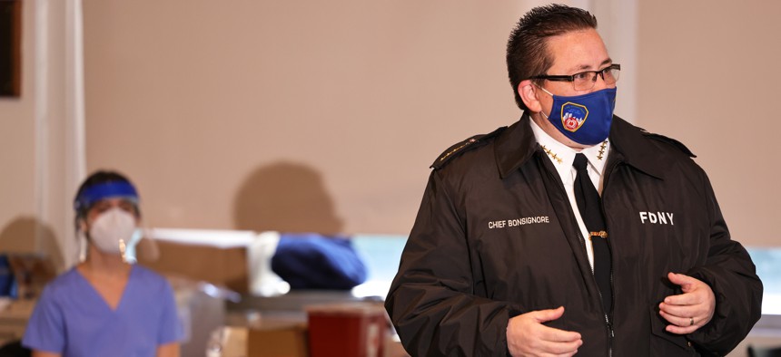 Lillian Bonsignore speaks at a 2020 vaccination event for EMTs at the Fire Academy. 