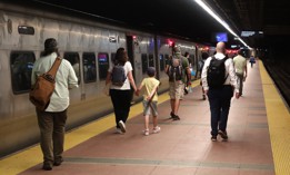 Commuters board a Metro-North Railroad train at Grand Central Terminal on June 13, 2024.
