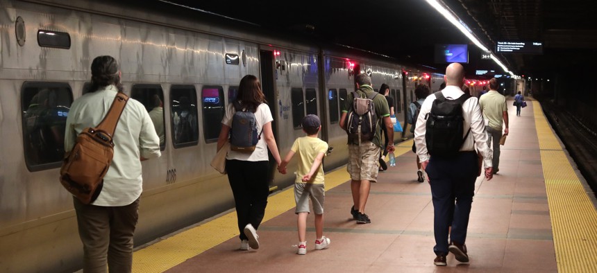 Commuters board a Metro-North Railroad train at Grand Central Terminal on June 13, 2024.