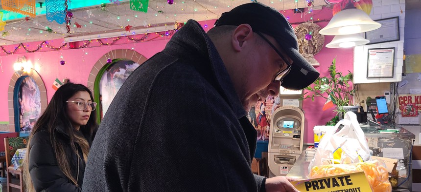 State Sen. Gustavo Rivera visits a local business to educate constituents about their rights when dealing with ICE.