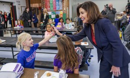 Gov. Kathy Hochul visits a school cafeteria on Dec. 12, 2025, to announce that more than 150 million free school meals have been served to students since the start of the school year.