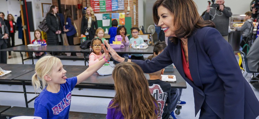 Gov. Kathy Hochul visits a school cafeteria on Dec. 12, 2025, to announce that more than 150 million free school meals have been served to students since the start of the school year.