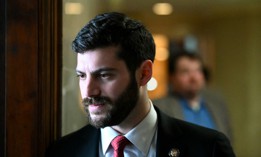 Assemblymember Alex Bores, seen here at the state Capitol on May 13, 2024, said he left Palantir over its work with ICE. But he didn't leave quickly.