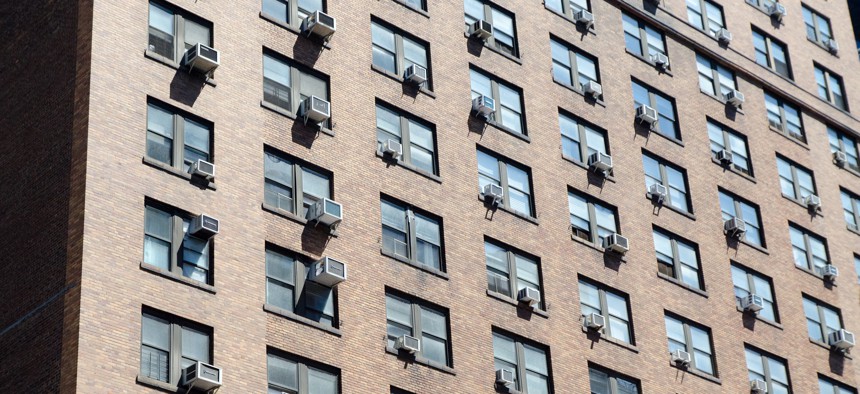 An air conditioning requirement would likely be addressed by more window units.