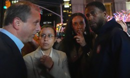 Council Members Tiffany Cabán and Sandy Nurse join a protest after ICE raids on Canal Street in October. They spoke with then-Comptroller Brad Lander, left, and Public Advocate Jumaane Williams, right.