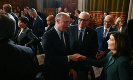 Assembly Minority Leader Will Barclay shakes hands with Gov. Kathy Hochul after her budget address in January.